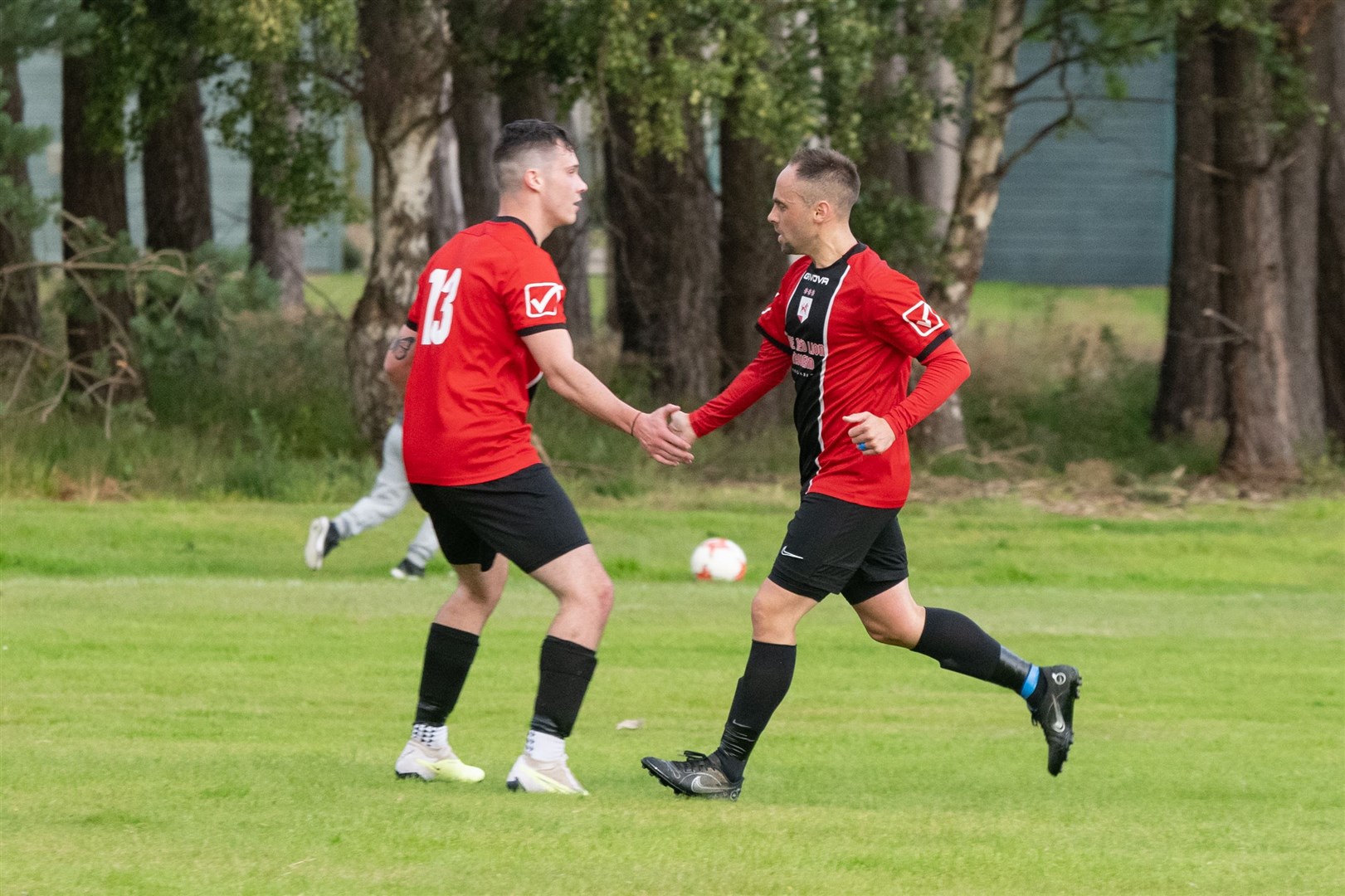Fochabers' Jordan Clark (left) celebrates his goal with Gary Burchell. Picture: Beth Taylor.