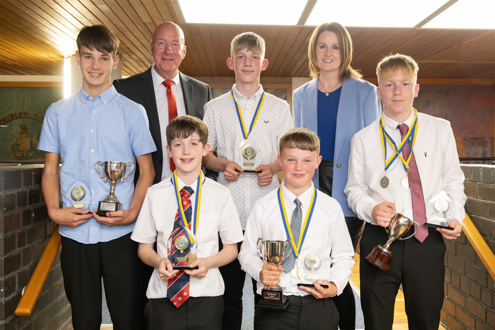 All the individual winners at Elgin Boys' Club's awards night with Neil Simpson and Margaret Ramage. Picture: Beth Taylor.