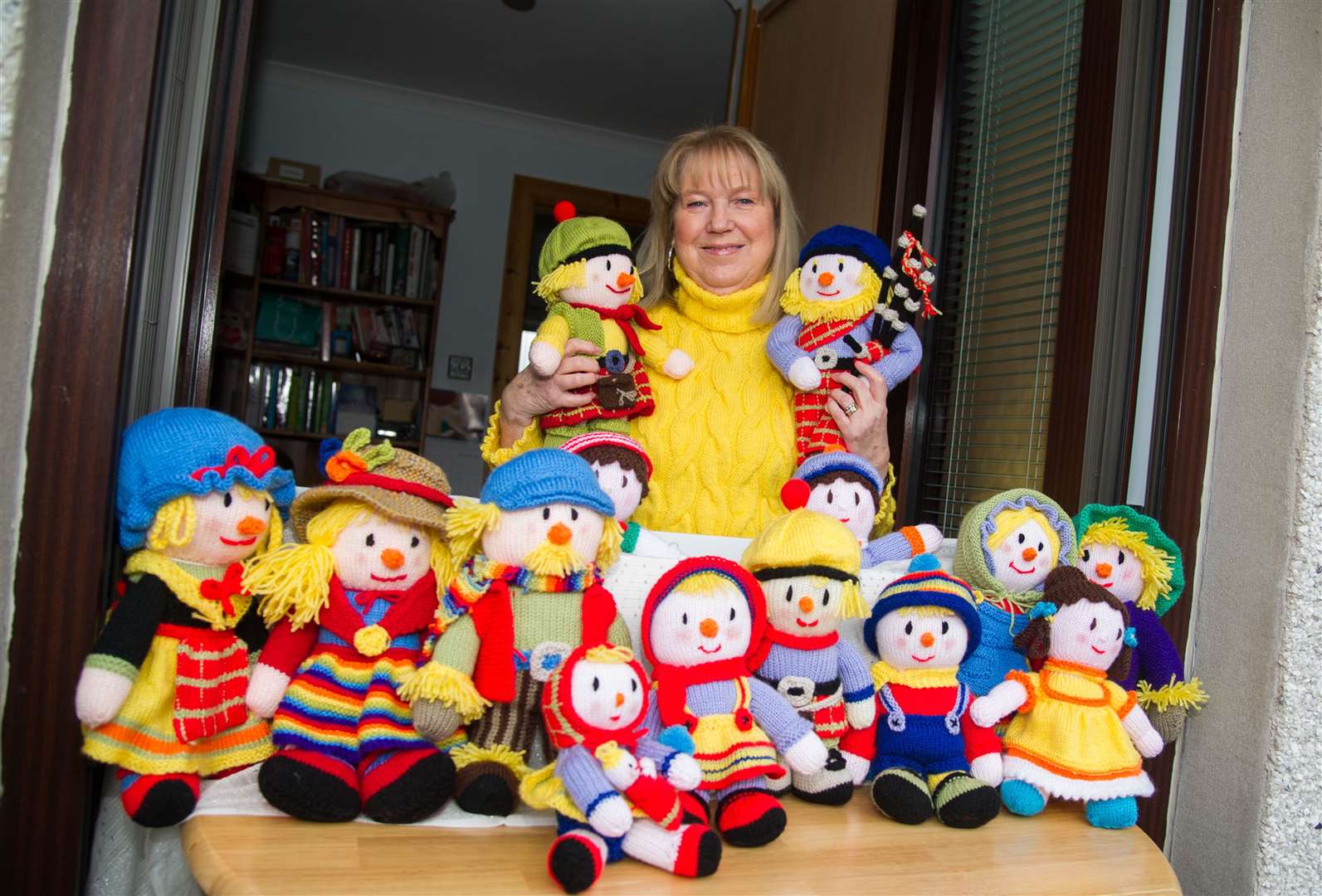 Karen Henderson with the dolls she has been knitting during Lockdown. ..Picture: Becky Saunderson..