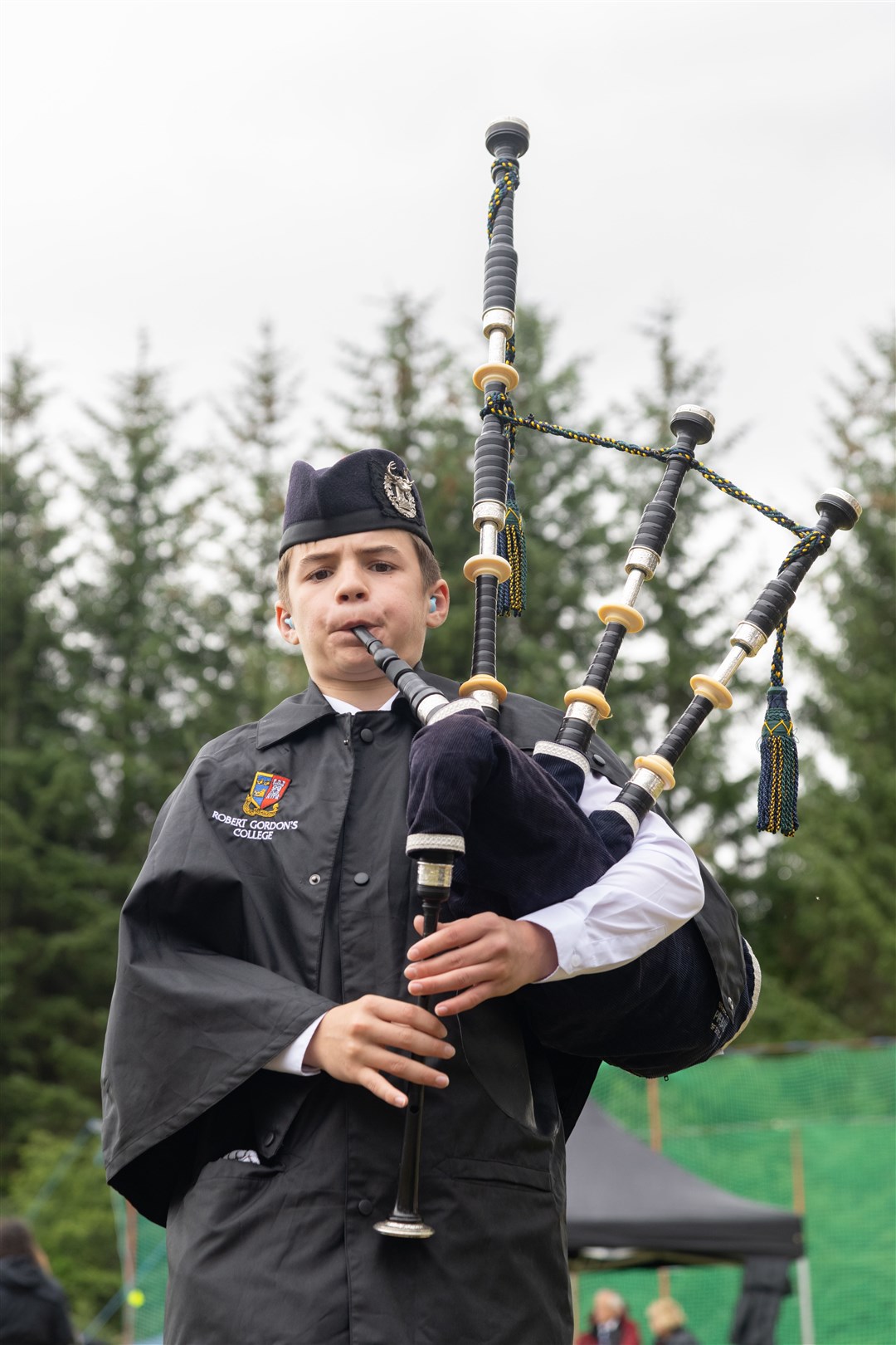 Bagpiper performing in the rain...180th Tomintoul Highland Games 2023...Picture: Beth Taylor.