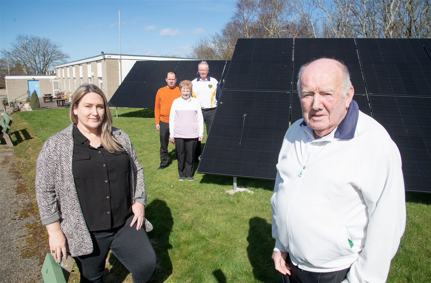Karen Adam MSP and club president Allan Petrie (front) are joined by (back from left) club member Brian Strachan, secretary Margaret Petrie and vice-president Steve Horrocks in admiring the new solar panels. Picture: Daniel Forsyth