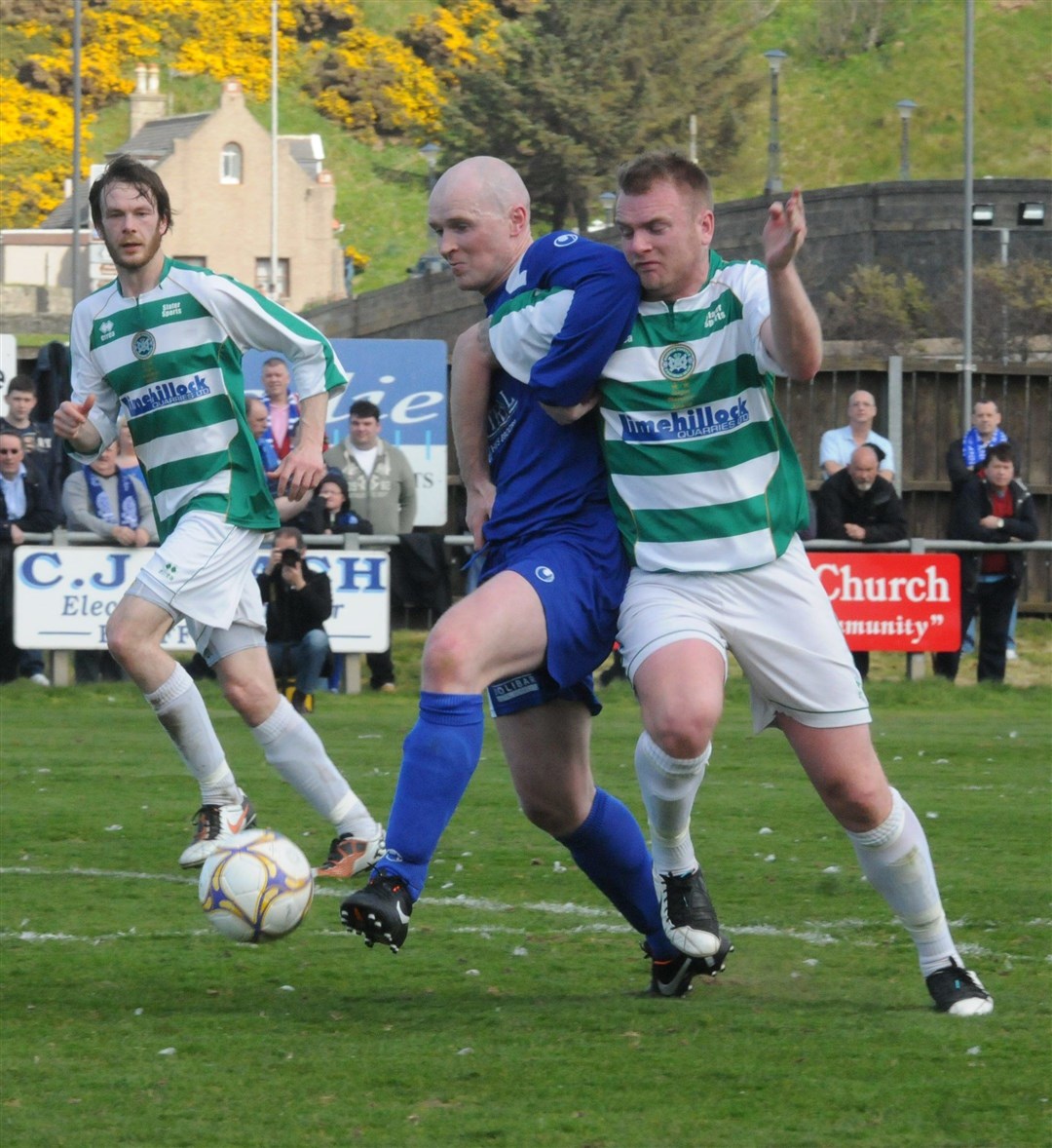 Martin Johnston (centre) in action for Cove Rangers against Buckie Thistle in 2012.