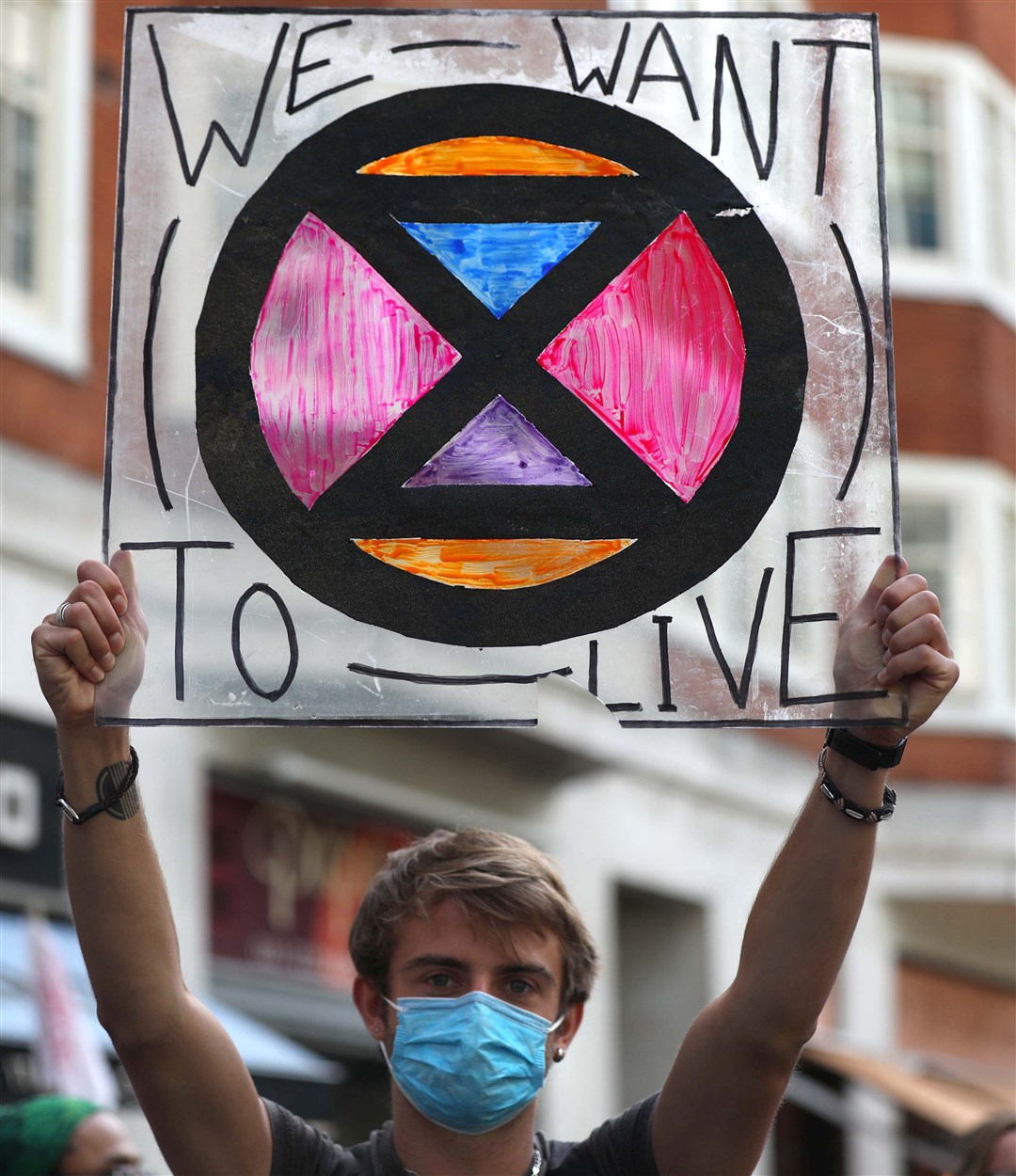 An Extinction Rebellion protester outside the Home Office in London (Luciana Guerra/PA)