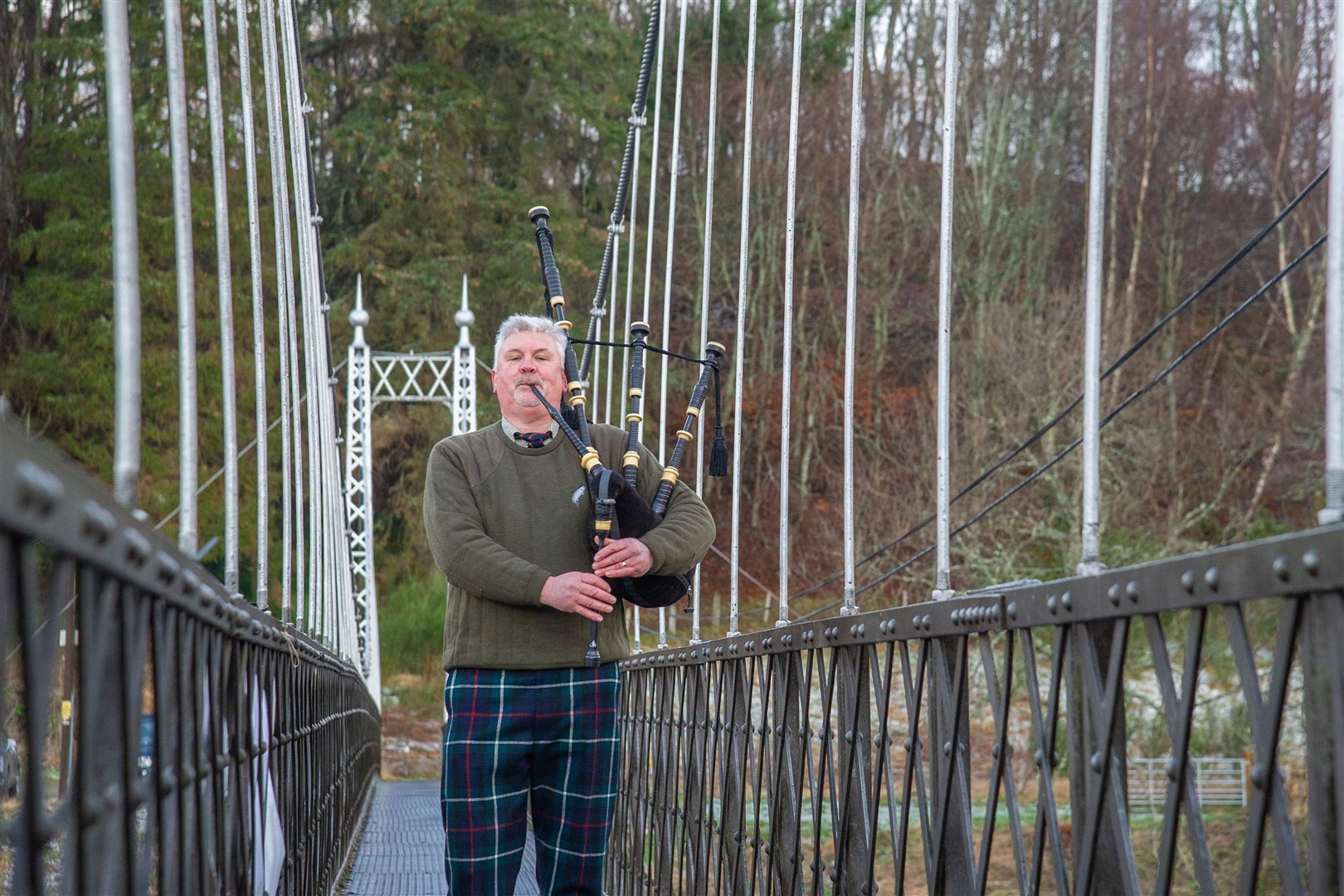 Allan Sinclair, pictured here at the opening ceremony in 2020, will once again be piping across the Penny Bridgethis year. Picture: Daniel Forsyth