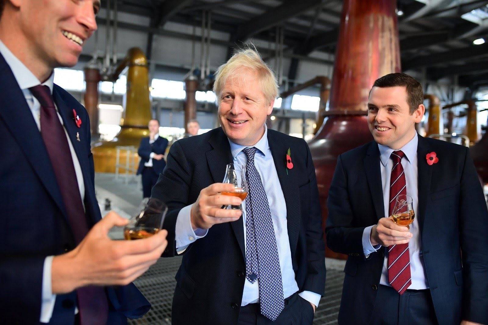 Boris Johnson and Douglas Ross at Roseisle Distillery.
