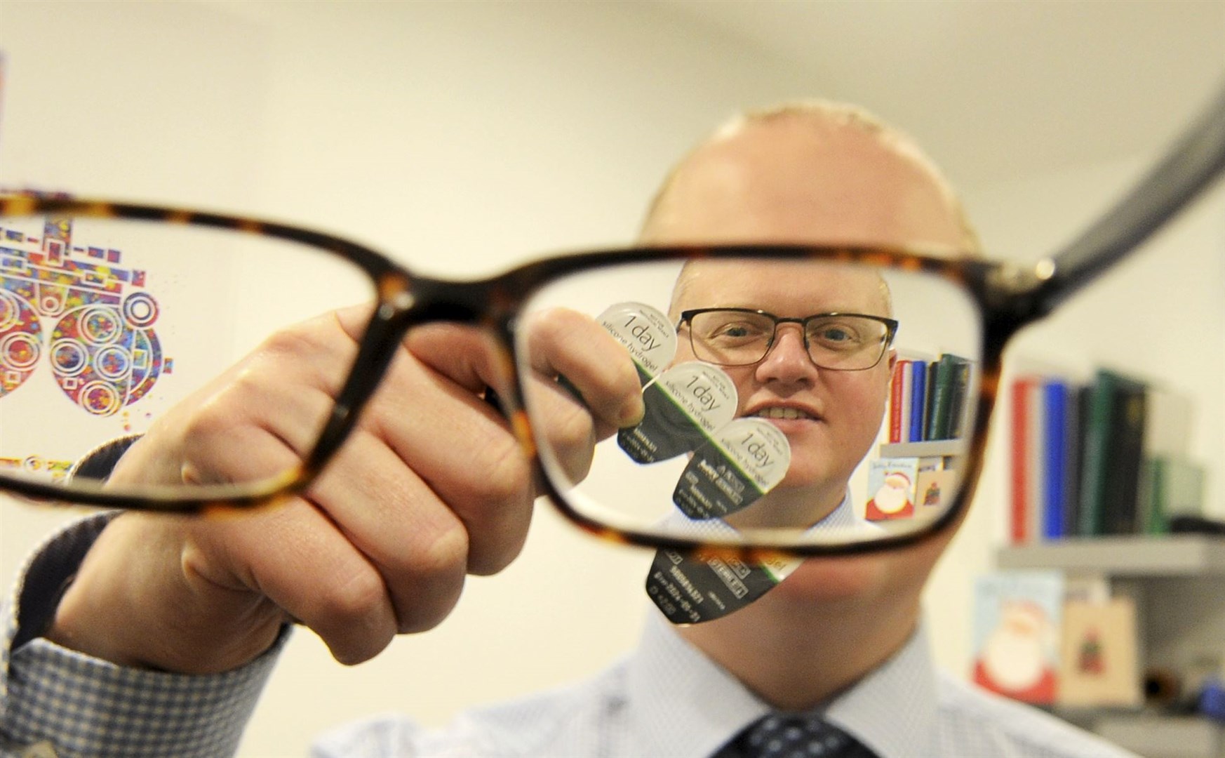 Optometrist Lloyd Griffiths is running a contact lens recycling scheme from his practice on Elgin's South Street. Picture: Eric Cormack.