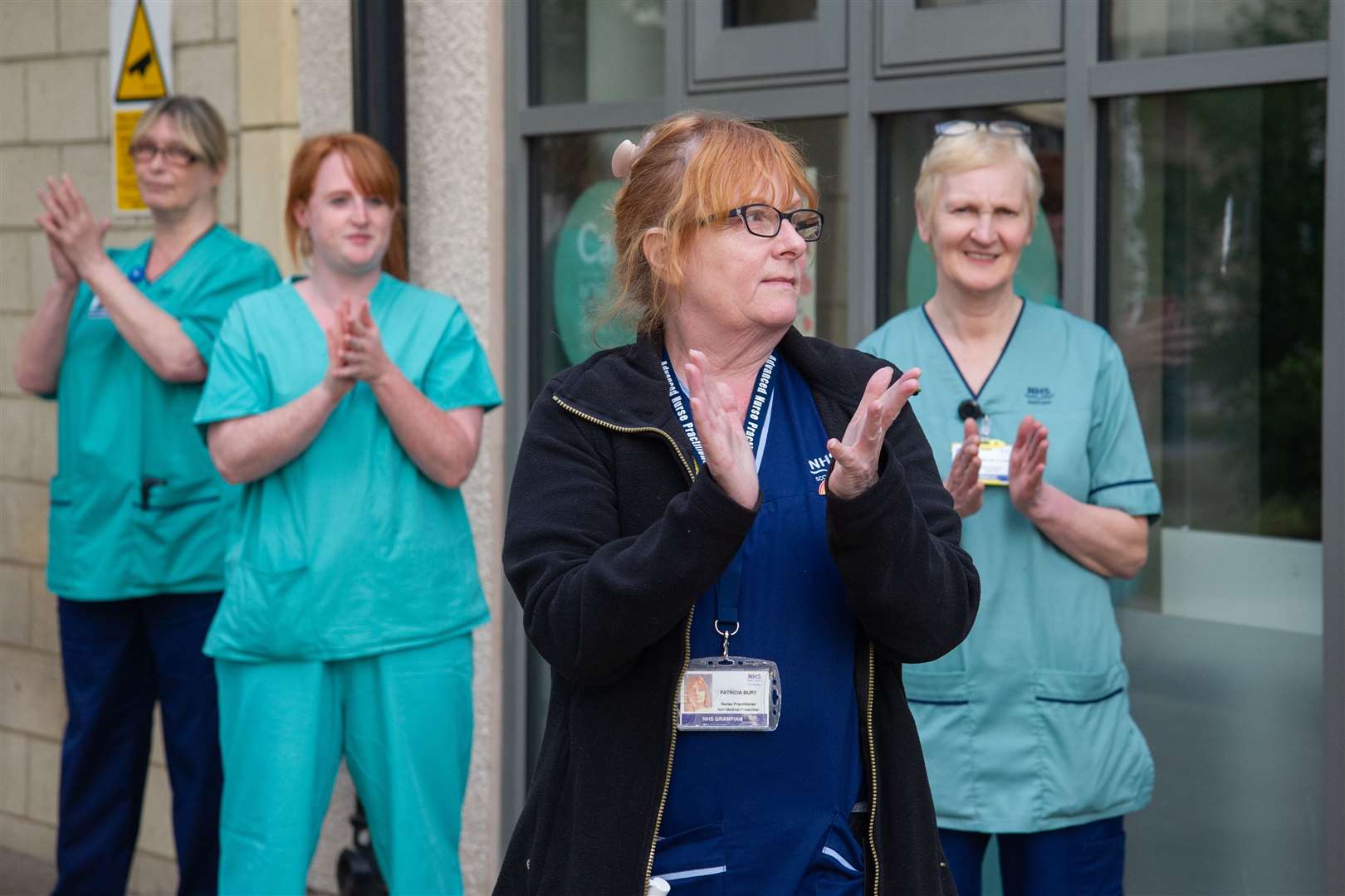 NHS workers at Dr Gray's Hospital join in with Thursday's 8pm nationwide applause for their fellow key workers during the coronavirus pandemic. ..Picture: Daniel Forsyth..