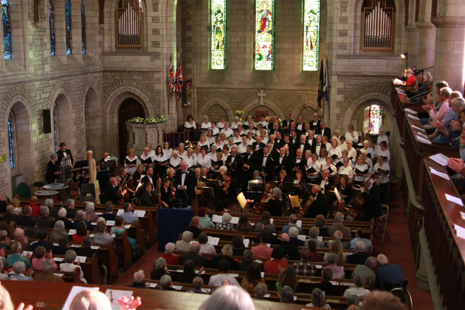 The choir and conductor at the end of their last Spring Concert on May 11 this year.