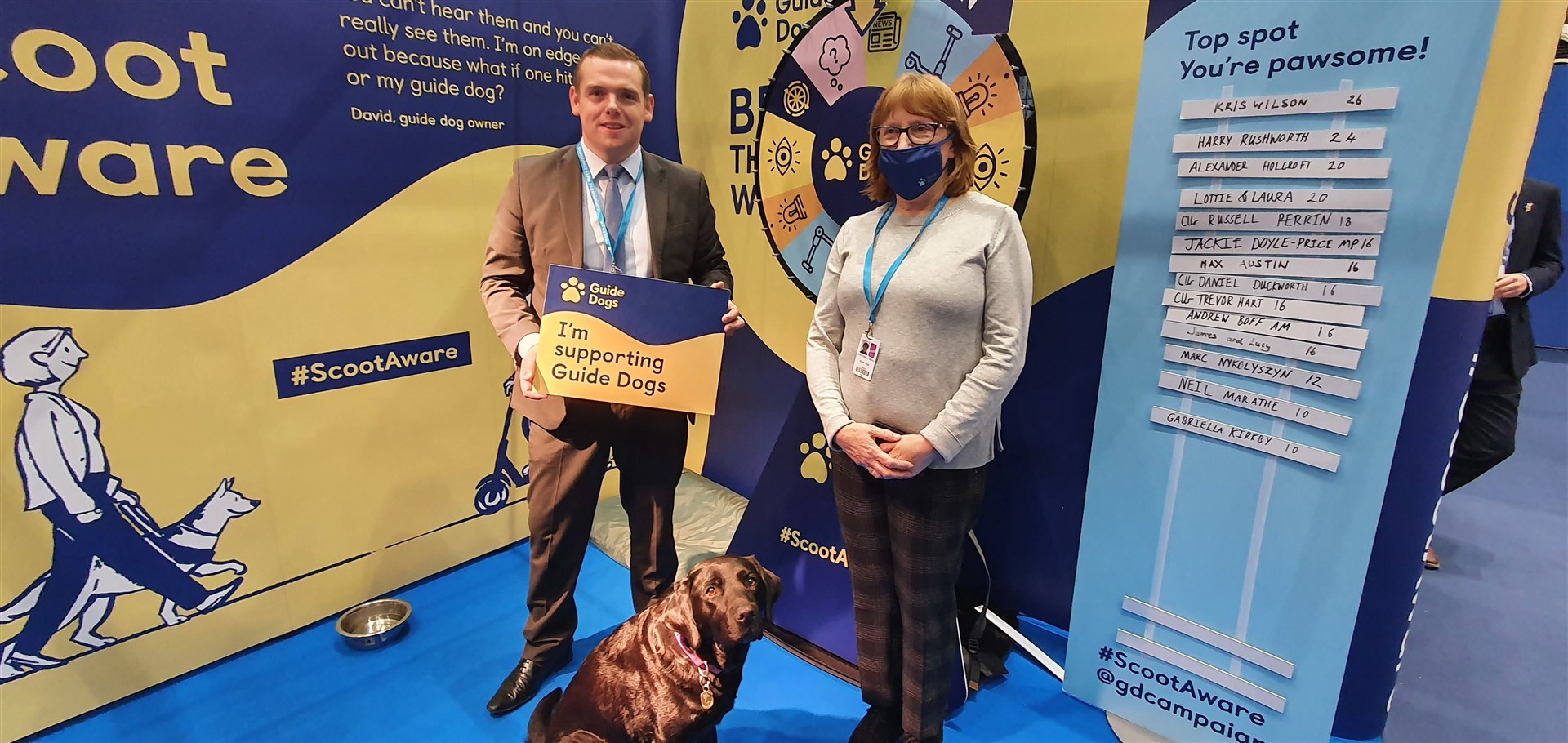 Moray Conservative MP Douglas Ross with Guide Dogs policy, public affairs and campaigns manager Anne-Marie Barry and guide dog Winnie.