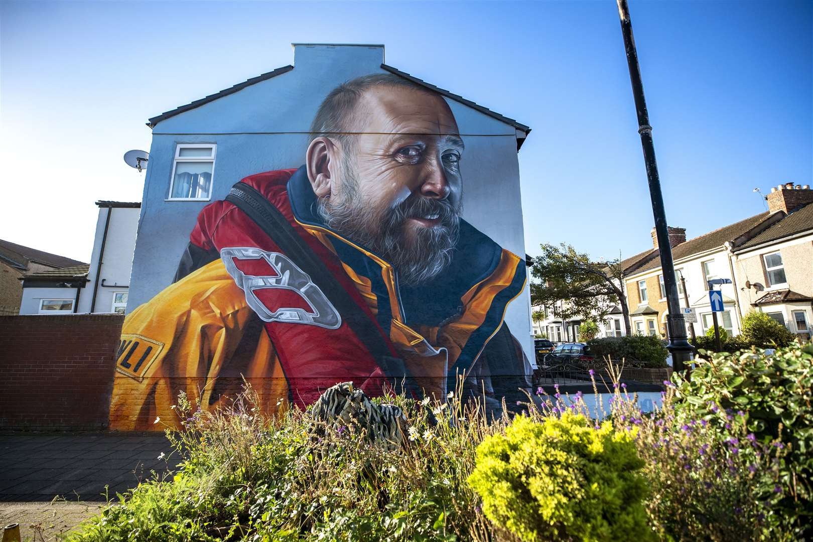 The mural of Mr Jones marks 40 years of service (Peter Byrne/PA)