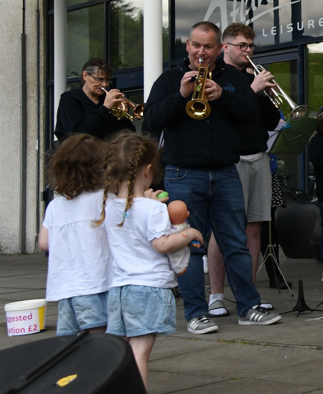 Glenn Munro and other band members entertain the youngest audience members.