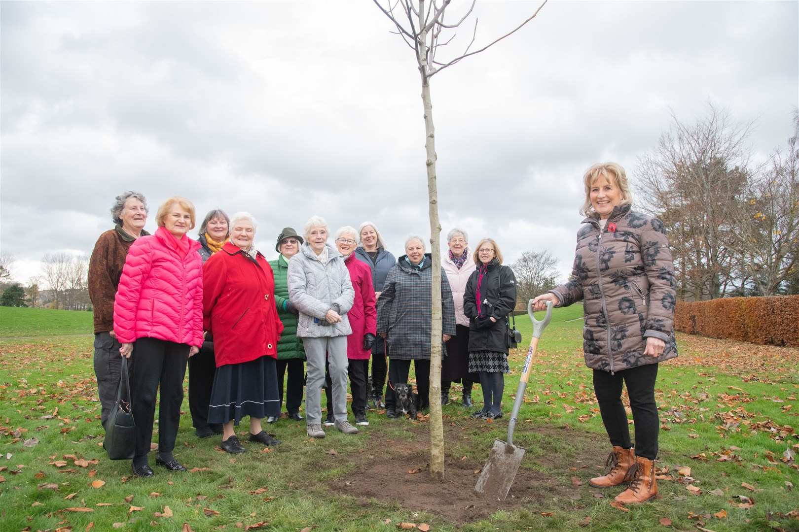 Elgin Flower Club chairwoman Gill Garrow (front right)...The Elgin Flower Club plant a walnut tree in Cooper Park as part of the Queen's Platinum Jubilee and to replace the Walnut tree that was blown down during Storm Arwen in November 2021...Picture: Daniel Forsyth..
