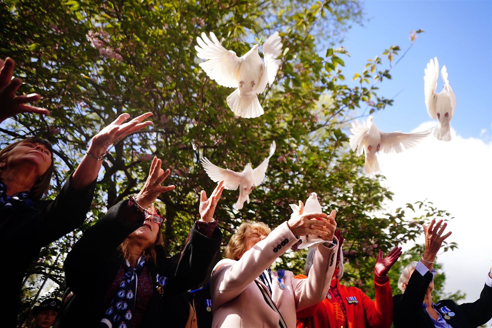 White doves are released in memory of Pc Yvonne Fletcher in St James’s Square, London (Victoria Jones/PA)