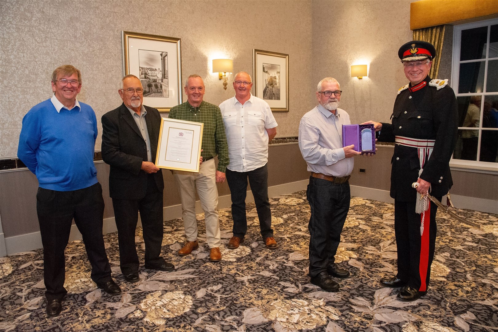 (From left) CVG members Stan Slater, Bruce Porter, Barry Addison, Willie Jappy, Alex Donn and Lord Lieutenant of Banffshire Andrew Simpson. Picture: Daniel Forsyth