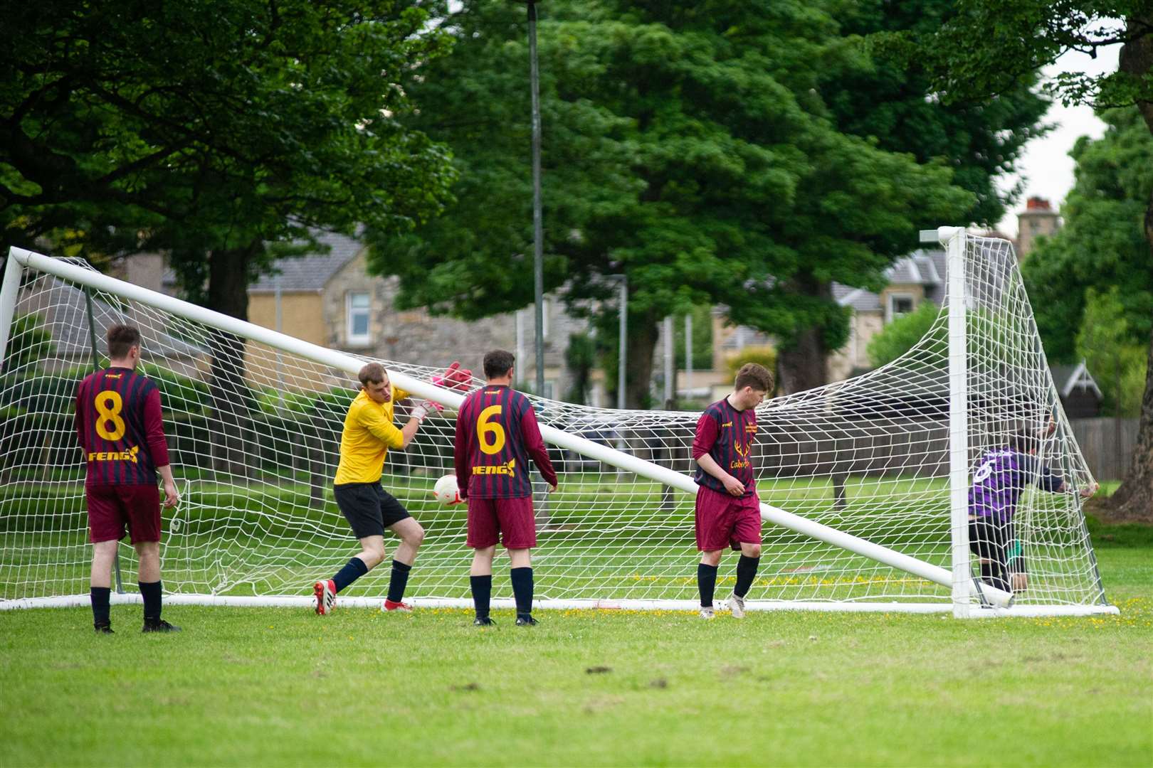 Trying to raise the bar, literally, as Andrew Lloyd knocks the Caberfeidh crossbar down while heading in Mosset's first of the evening in a 5-4 win in the Forres and Nairn Welfare League. Picture: Daniel Forsyth