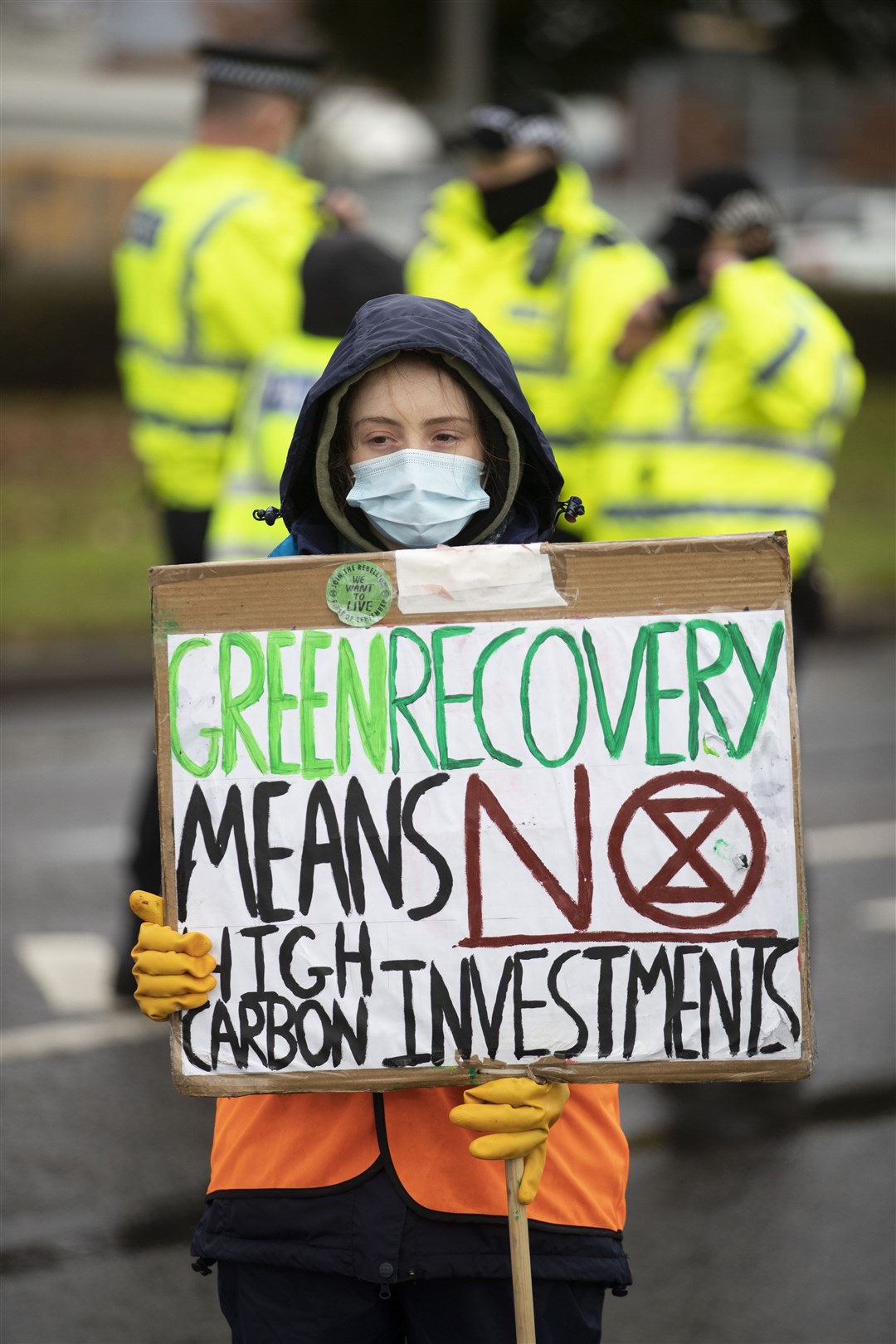 One activist demonstrating outside the Ineos oil refinery at Grangemouth (Jane Barlow/PA)