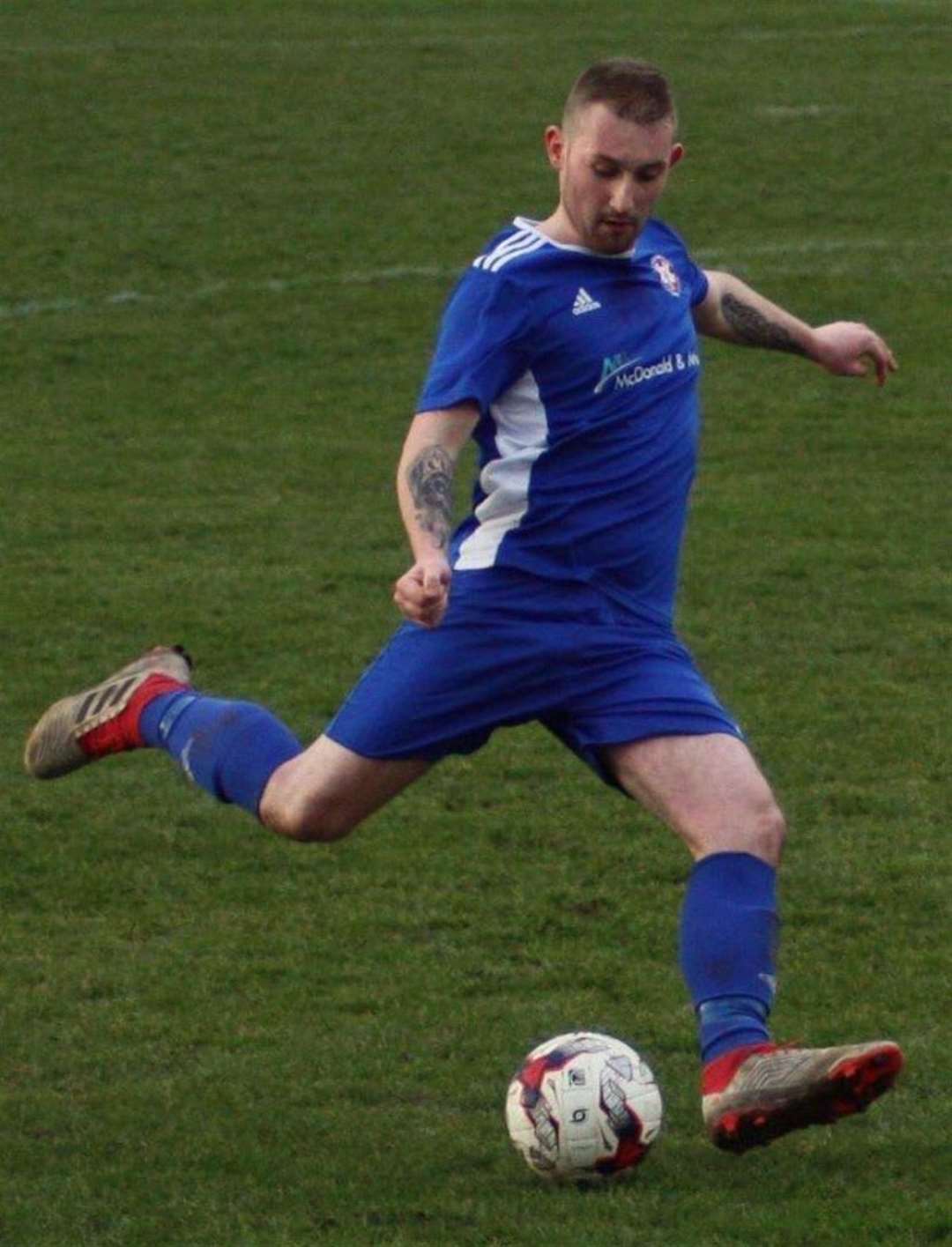 Dean McCall in action for Lossiemouth.