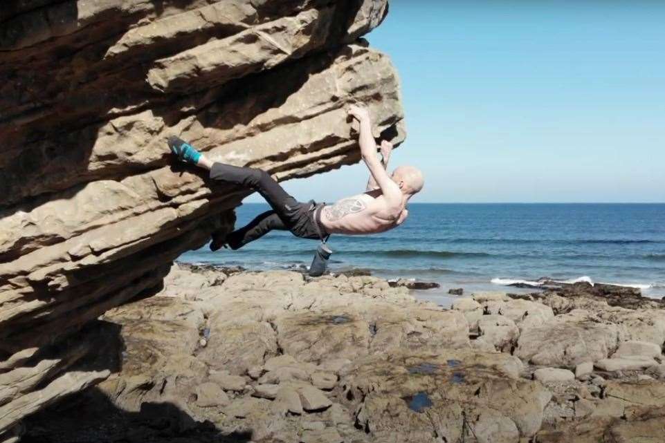 Shane Younie navigates The Prow overhang at Cummingston.