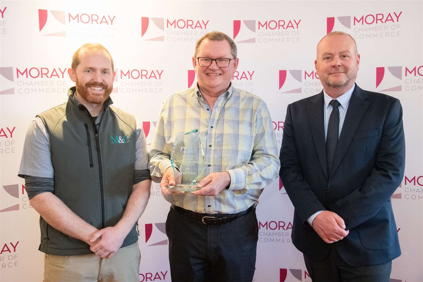 Small Business of the Year winners: Mackenzie and Cruickshank..Left to right;  Alistair, Peter Wilson and David Reid (HIE)... Moray Chamber of Commerce Awards Luncheon at the Laichmoray Hotel, Elgin.  Tuesday, April 19, 2022...Photo: Daniel Forsyth..