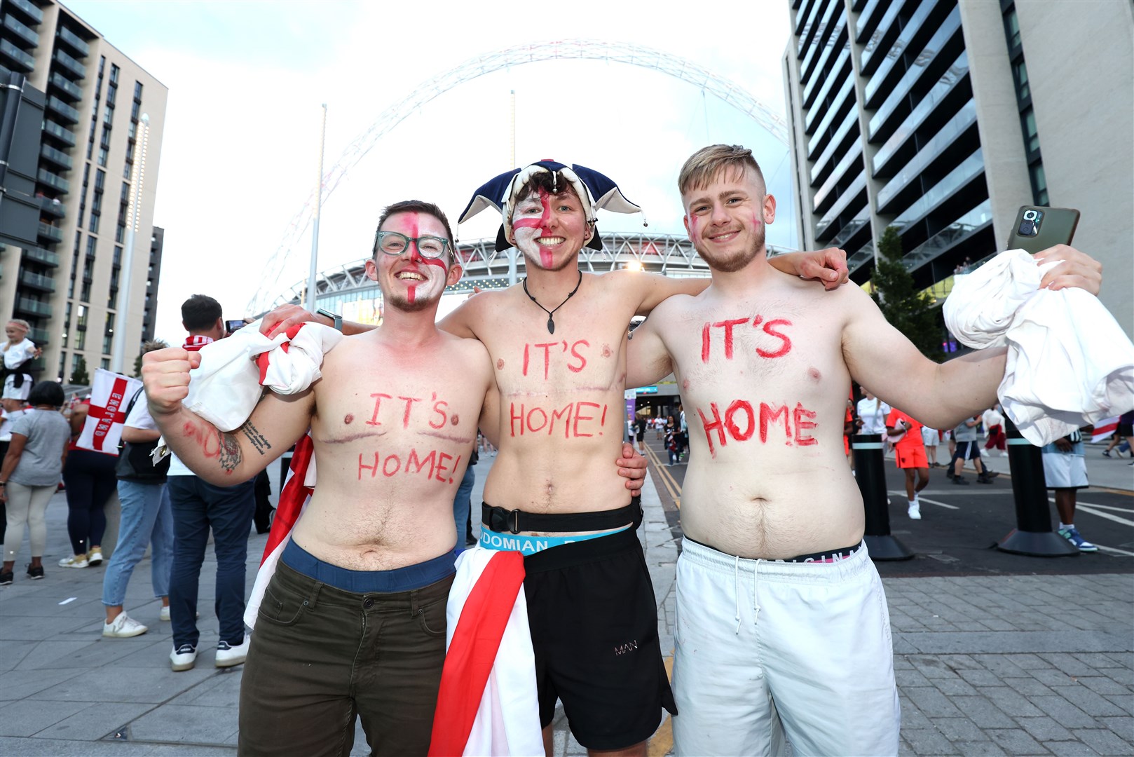 England fans celebrate with body paint at Wembley Stadium (James Manning/PA)