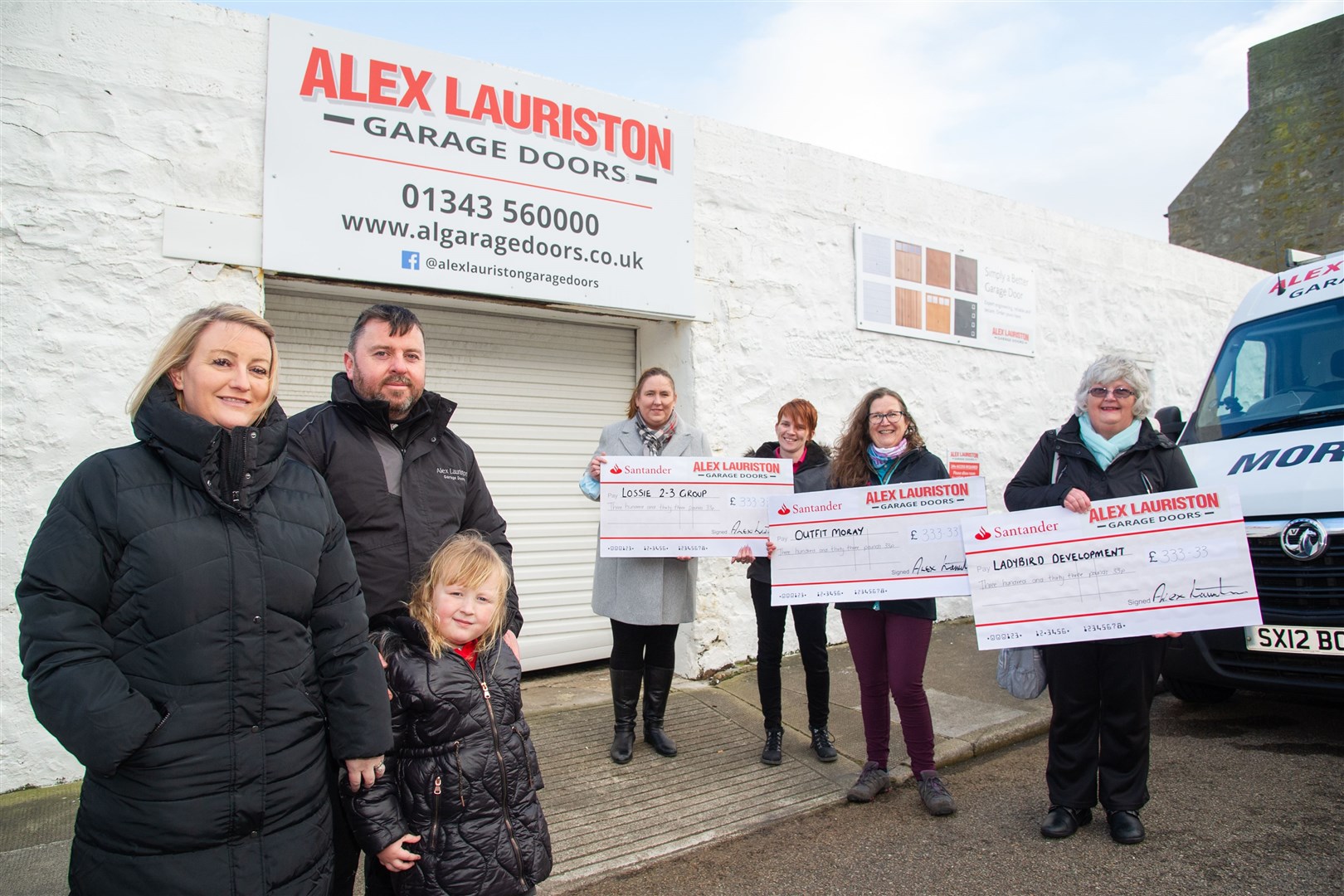 Three local charities in Lossiemouth receive a share of £1000 from Alex Lauriston Garage Doors. From left; Emma, Alex and Sadie Lauriston, Louise McBride and Kirsty Middleton (Lossiemouth 2-3 Group), Karen Cox (Outfit Moray) and Ann Ingram (The Ladybird Group). Picture: Daniel Forsyth