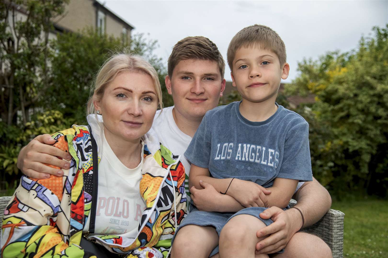 From left, Anna, Volodymyr and Nikolas Trukhina have settled in Elgin well since fleeing their home in Kyiv. Picture: Becky Saunderson