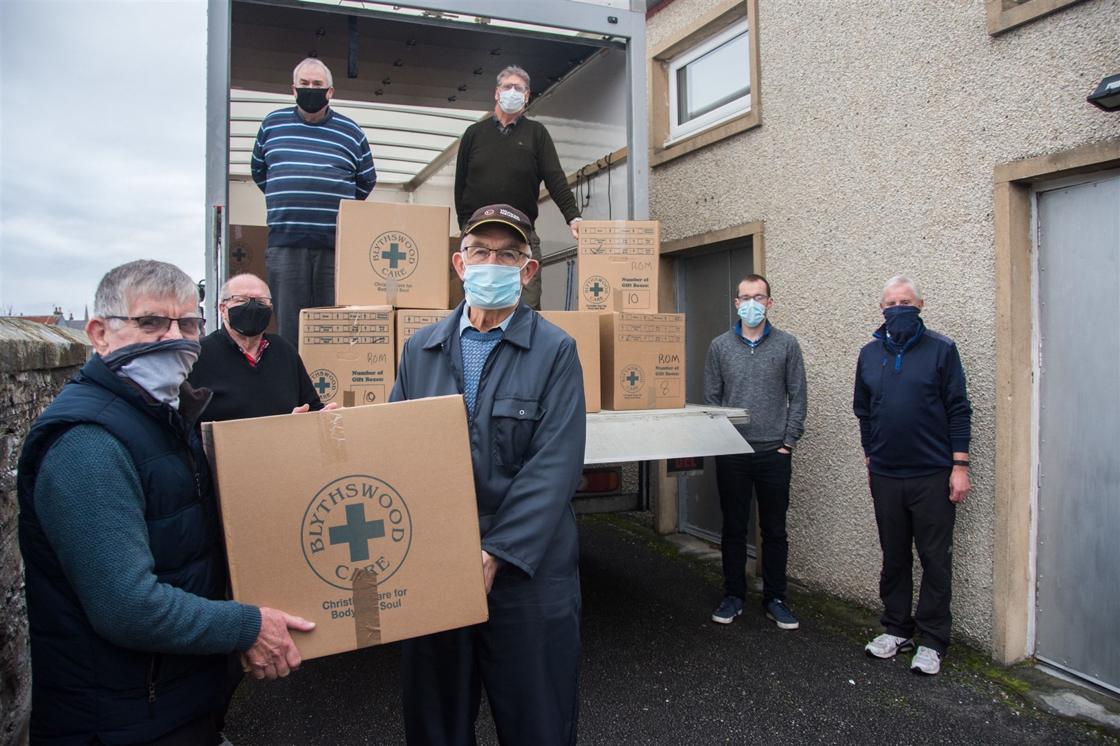 Buckie Blythswood Support Group organiser George Flett (left) helps volunteers load filled shoeboxes on their way to Romania. Picture: Becky Saunderson