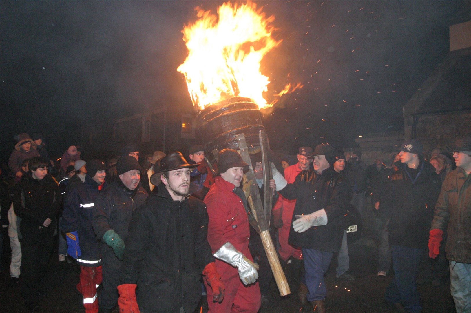 Carrying the Clavie through the streets of Burghead in 2008.