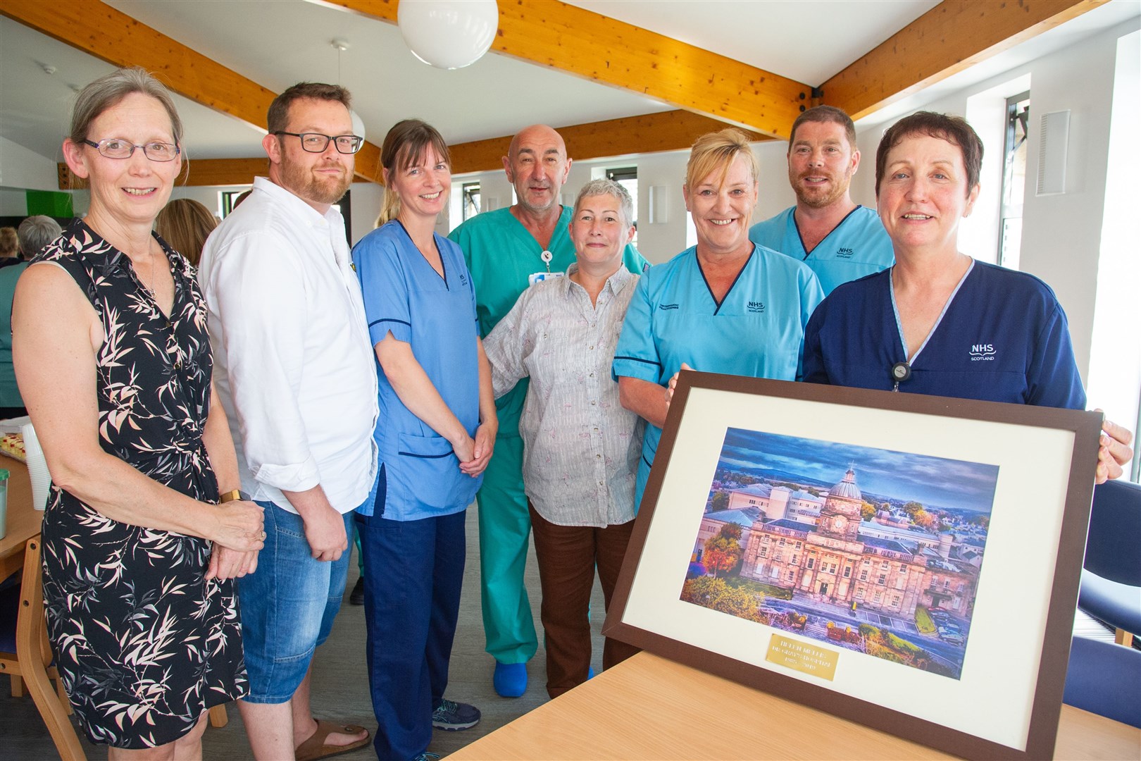 Helen was presented with a framed picture of Dr Gray's as one of her many leaving presents. Picture: Daniel Forsyth. Image No.044541.