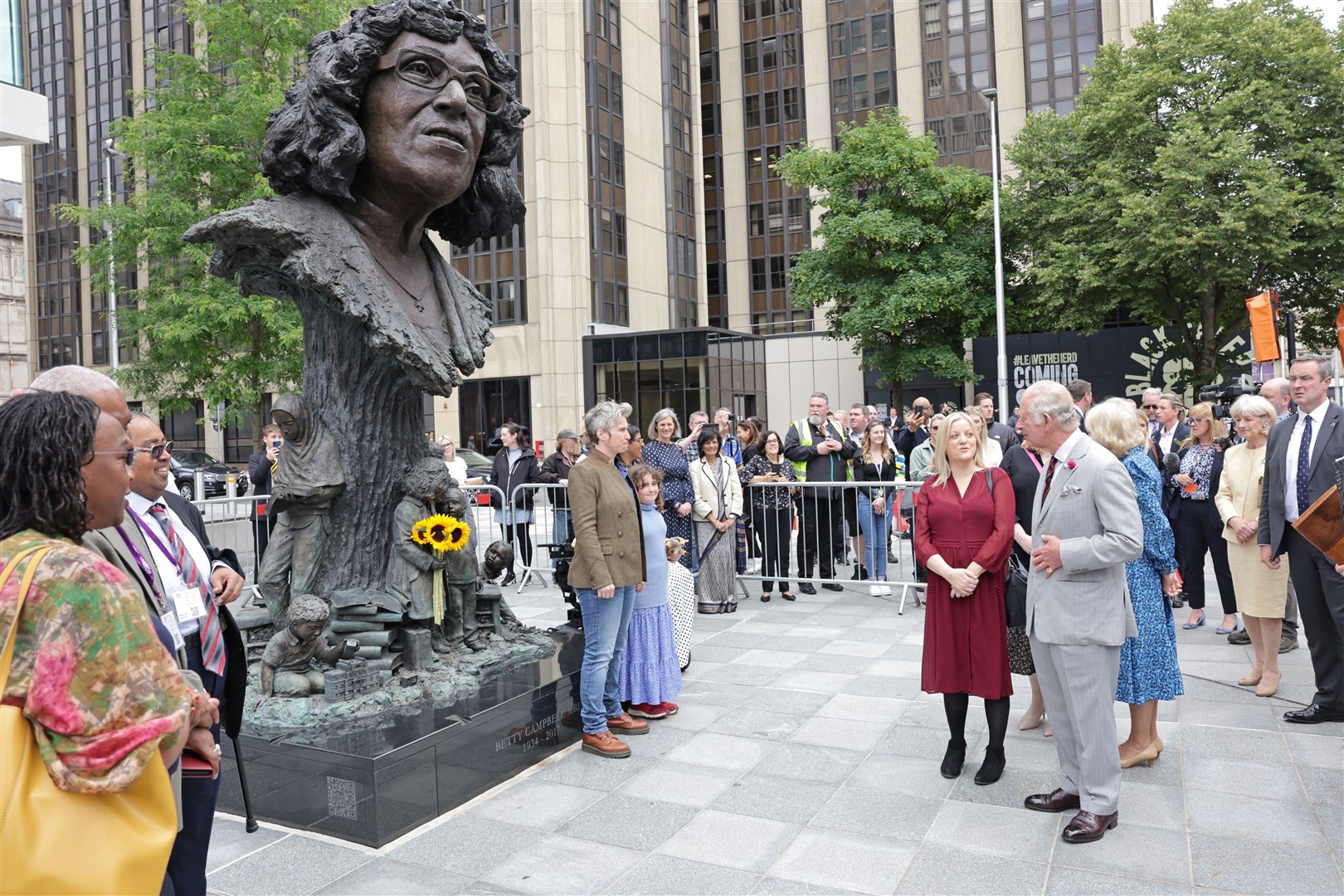 Charles and Camilla visit the statue of Betty Campbell, a Welsh community activist and Wales’ first black head teacher, at Central Square (Chris Jackson/PA)