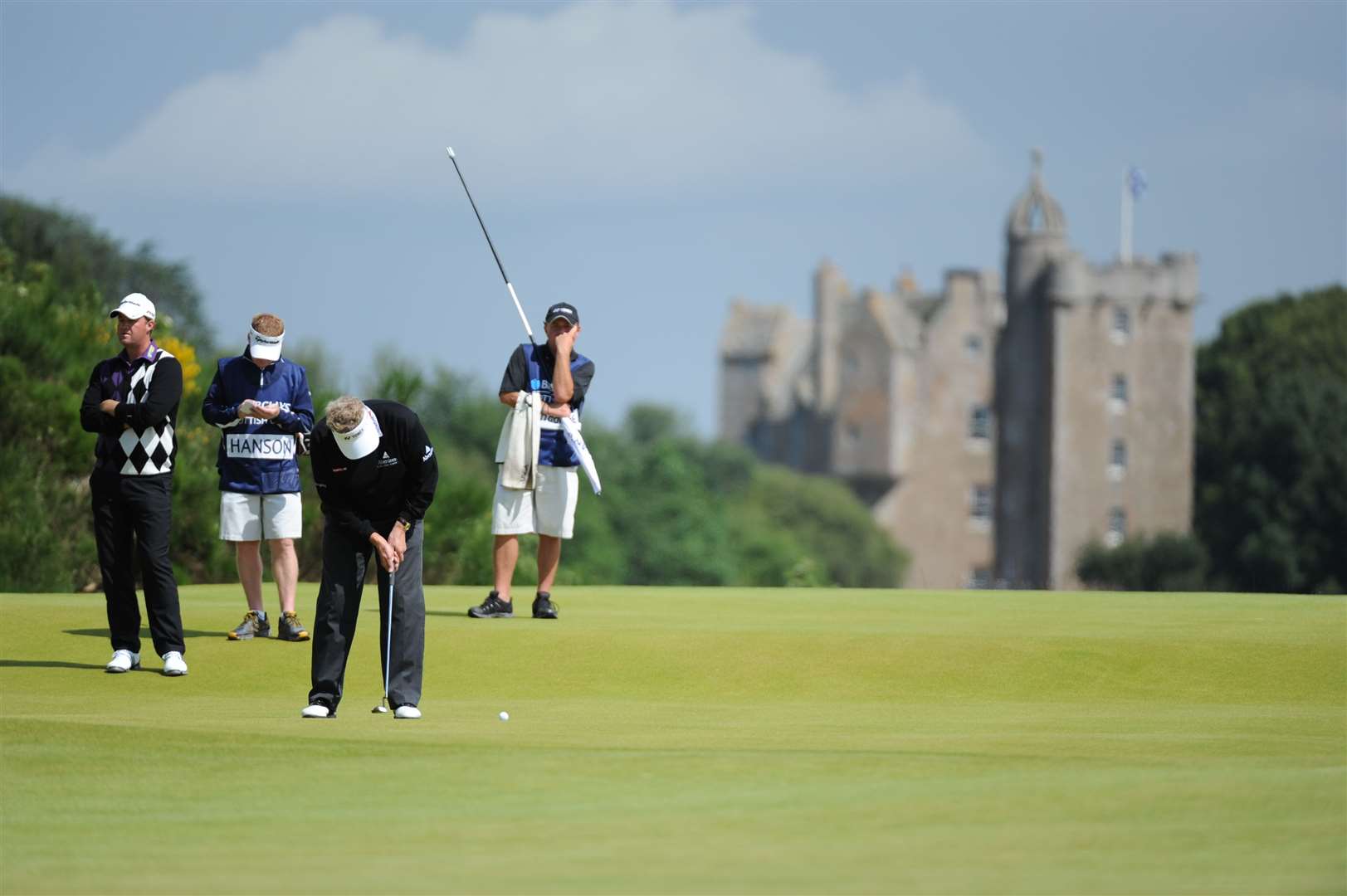 Colin Montgomerie on the green with the 17th century castle in the background.