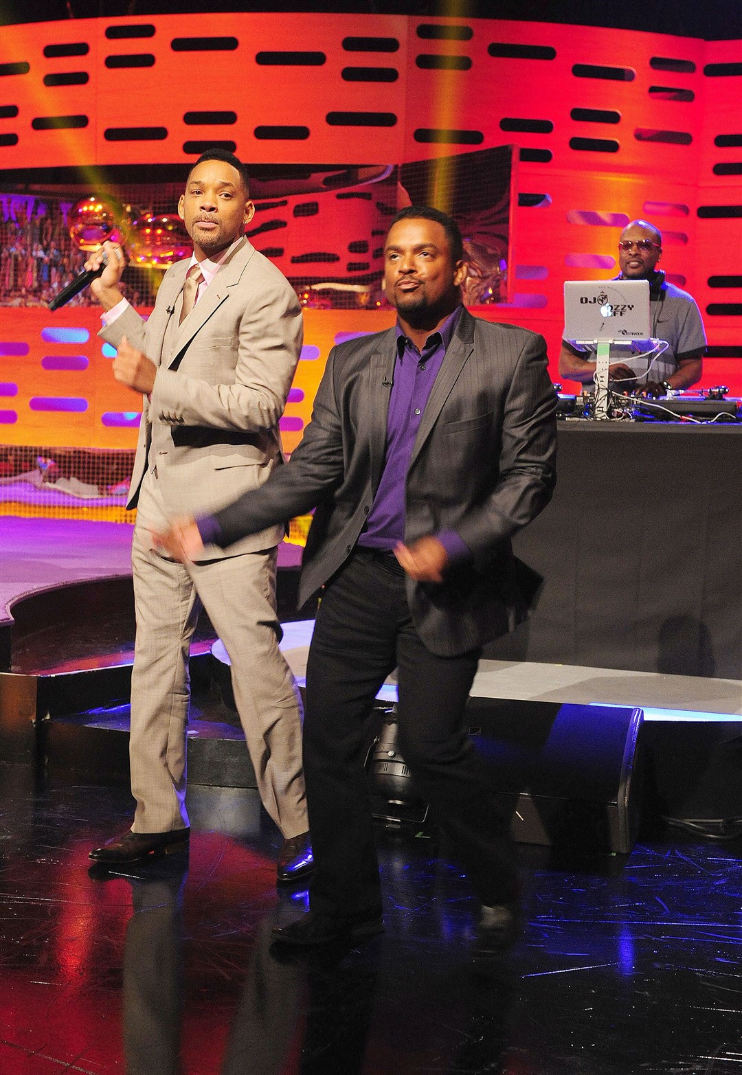 Will Smith, Alfonso Ribeiro and DJ Jazzy Jeff on the decks behind during filming of the Graham Norton show at the London Studios, in London (Graham Norton Show/PA)
