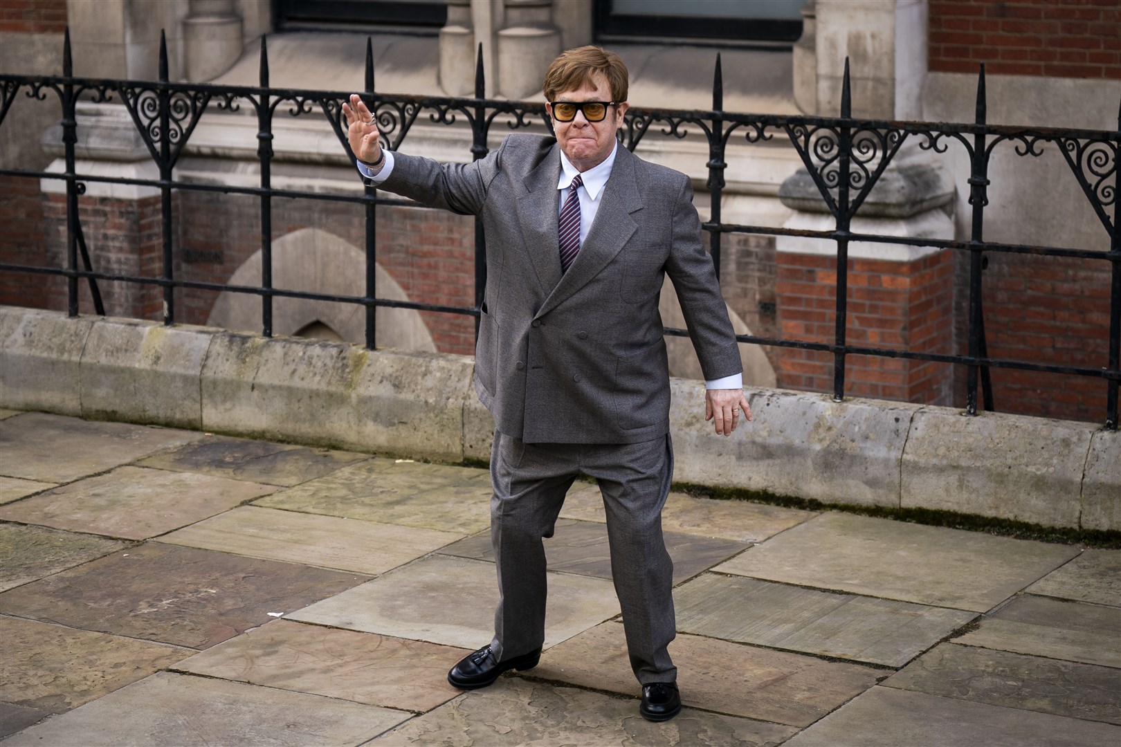 Sir Elton John leaves the court on Monday (PA)