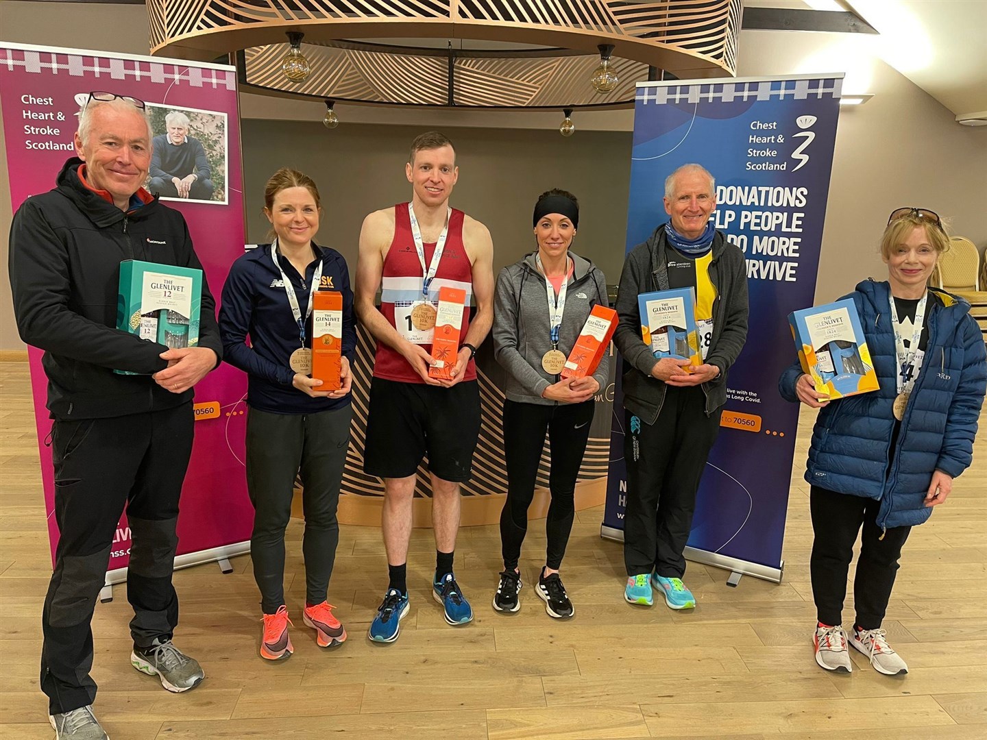 L-R: Robert Keenan (Fastest male veteran), Claire Howie (fastest female super veteran), Isaac Mann (fastest overall), Amy Hudson (fastest female senior), George McPherson (fastest male vintage) and Mary Mowat (fastest female vintage).