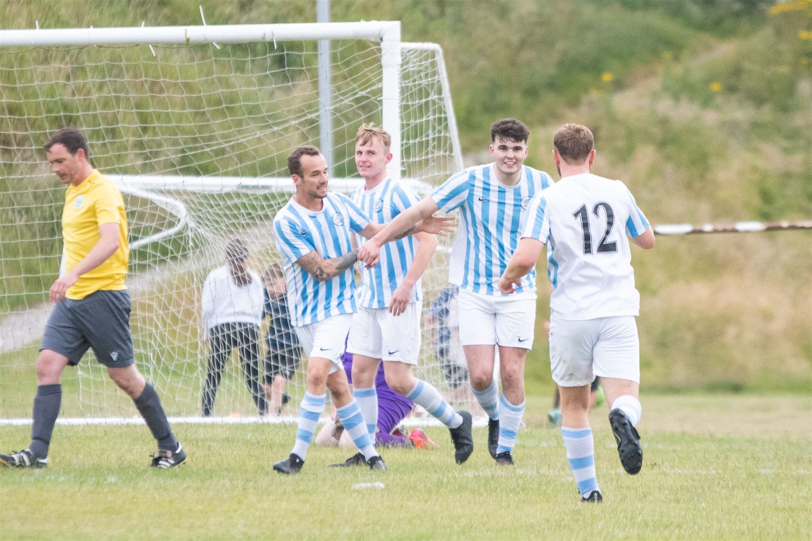 The RAF Lossiemouth team celebrate their equaliser at 1-1...Hopeman FC (4) vs RAF Lossiemouth (2) - Moray Welfare League 2023 - Hopeman 04/07/2023...Picture: Daniel Forsyth..