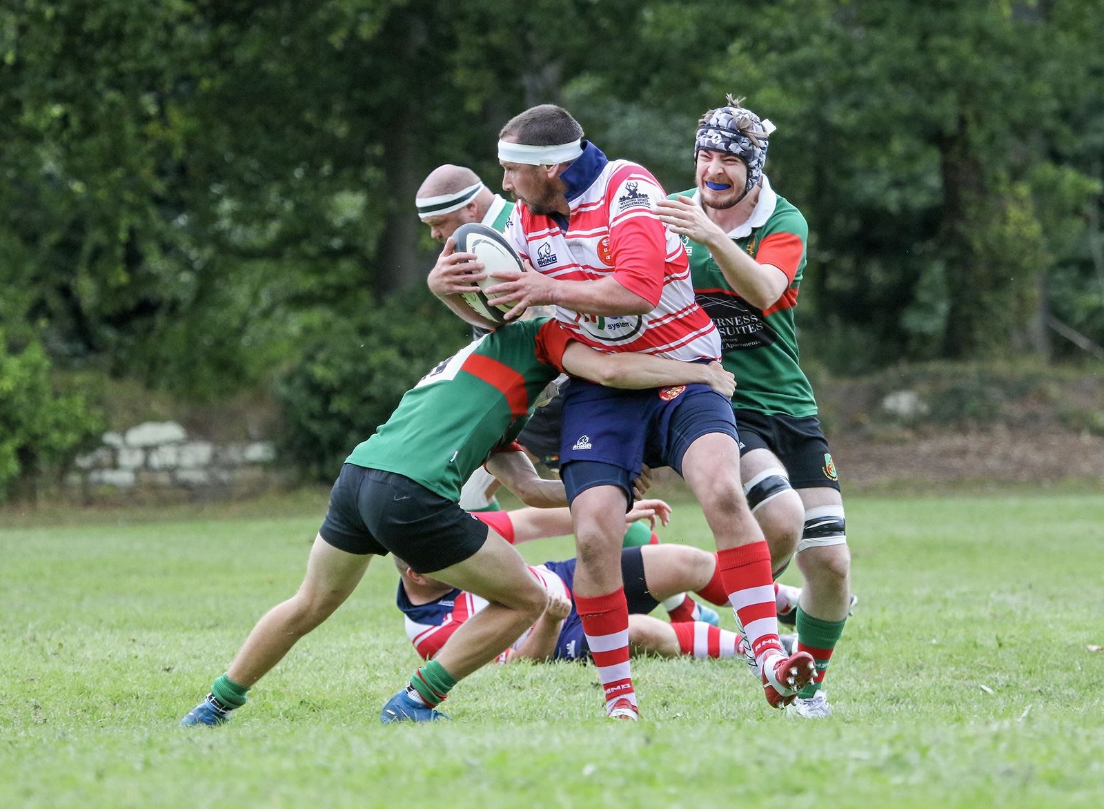 John Westmacott is tackled by two defenders. Picture: John MacGregor
