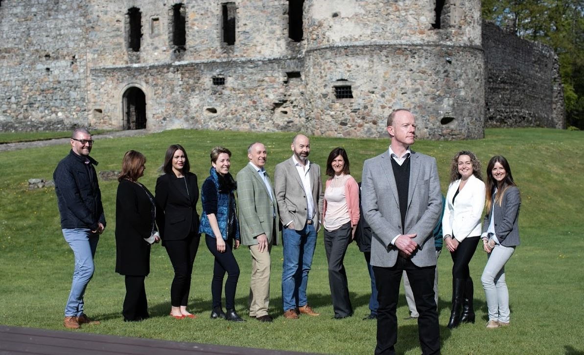 Laurie Piper, of Moray Speyside Tourism, with local tourism industry representatives at Balvenie Castle.
