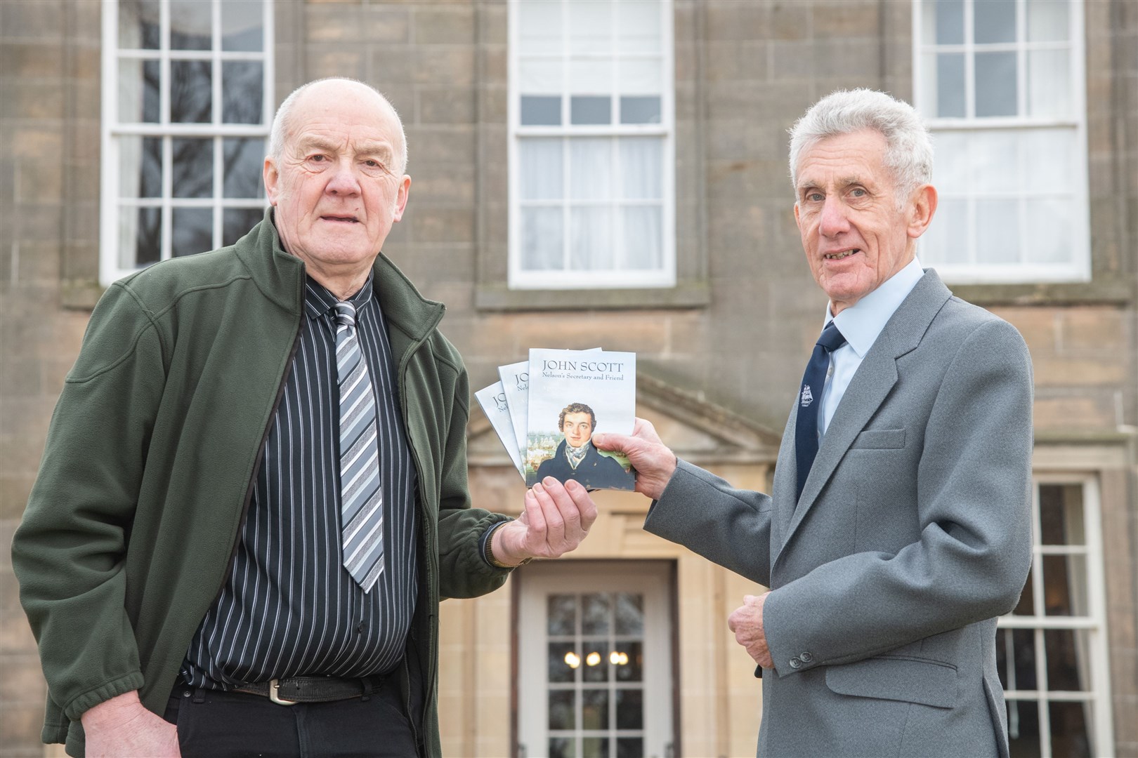 George Alexander (left) and John Maynard (right) with the book at the launch at Gordon Castle. Picture: Daniel Forsyth..