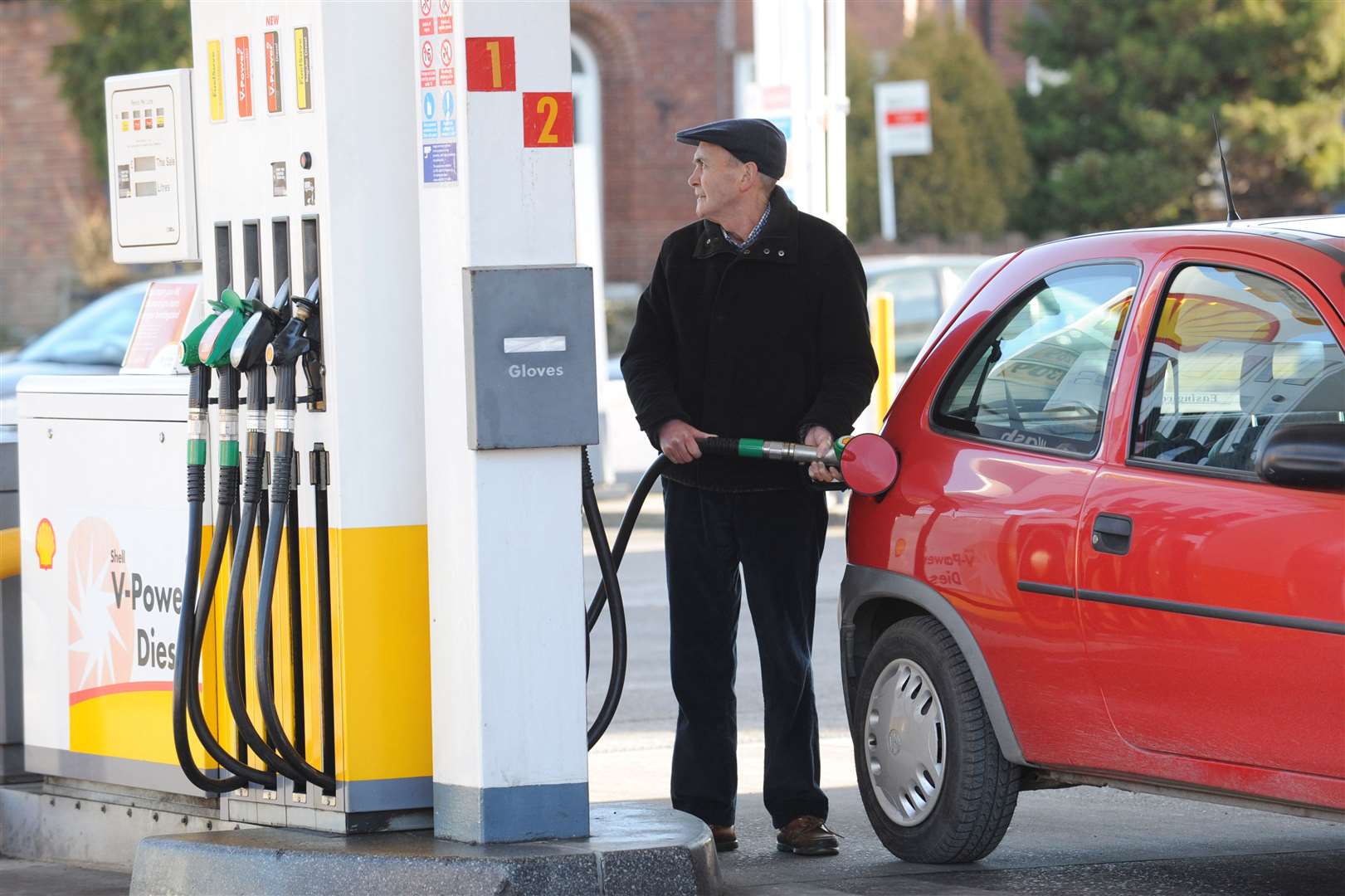 A man fills up his car with fuel (Anna Gowthorpe/PA)