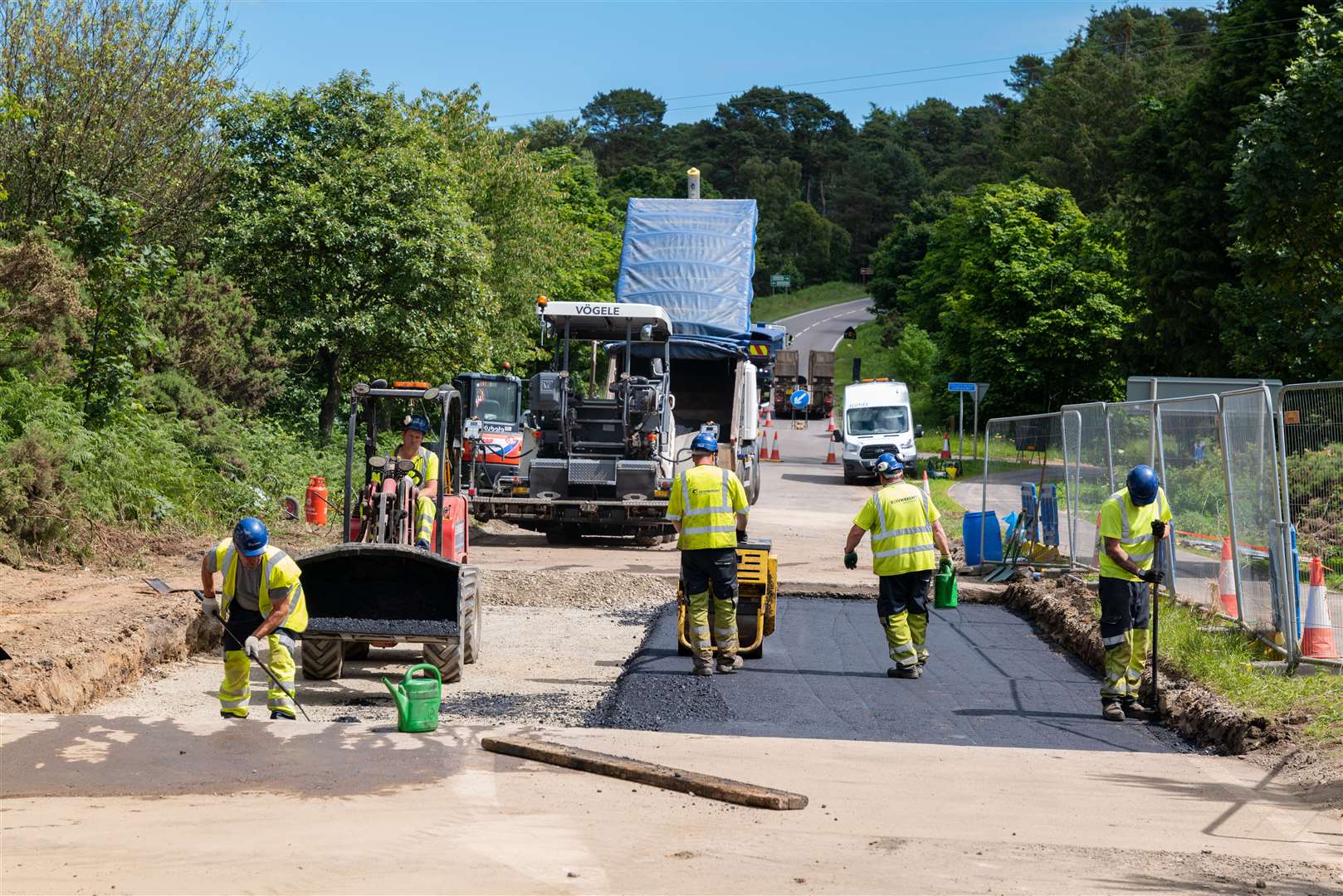 Workers continue the repair job to the A96 at Lhanbryde. Picture: Brian Smith Jasperimage