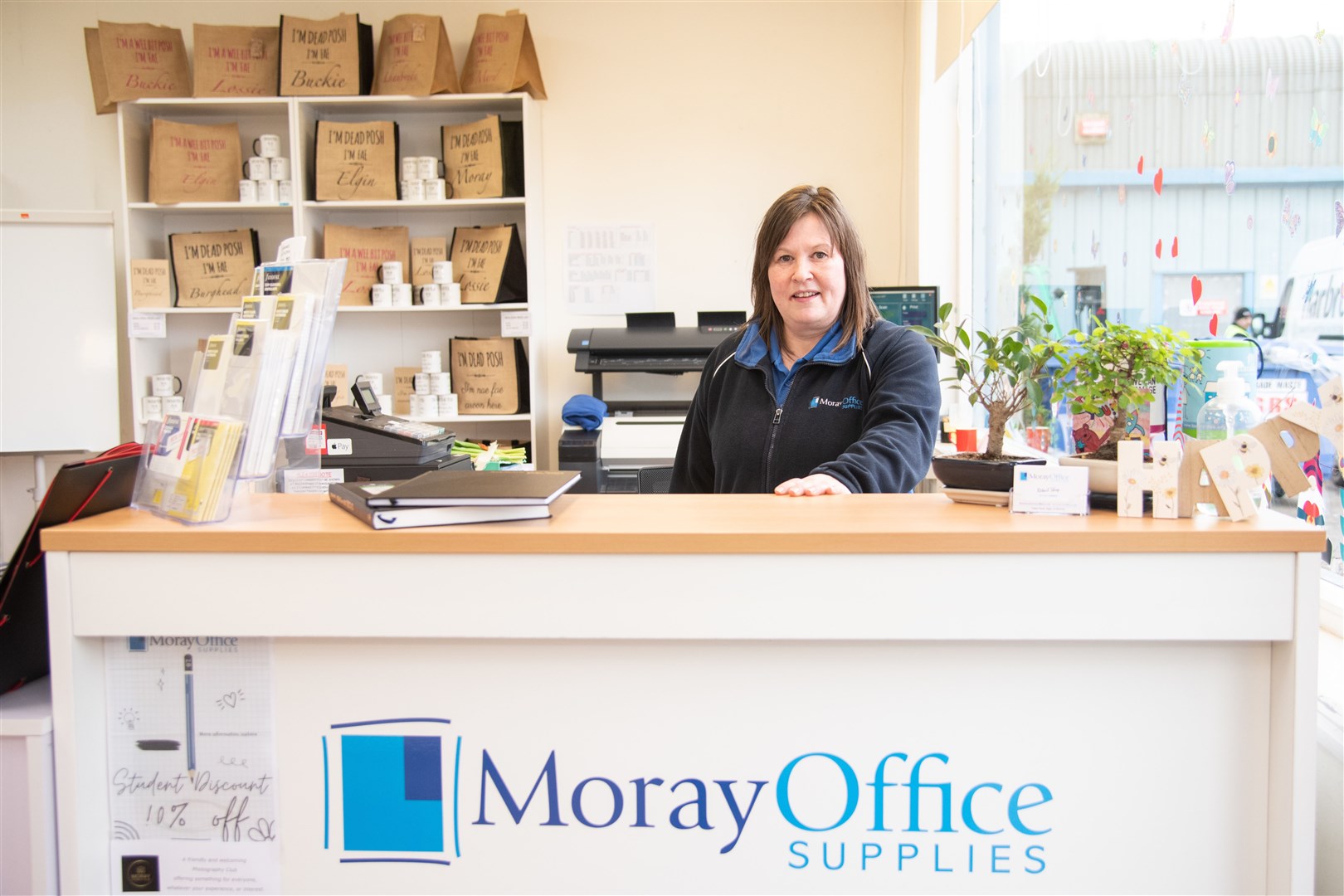 Cassie Russell welcomes customers to Moray Office Supplies.