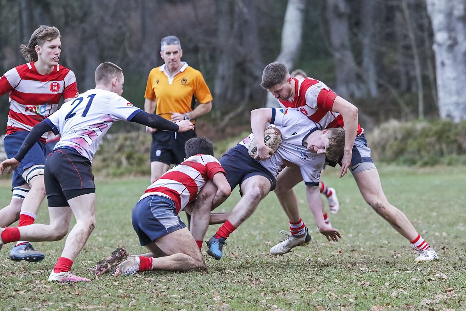 Stewart Bright and Rory Millar tackle. Calum Caven coming in to help. Picture: John Macgregor