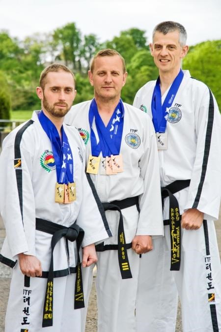 Elgin School of Taekwon-do trio Andy Smith, Andy Adam and Brian Johnson with their medals.Photo: Daniel Forsyth