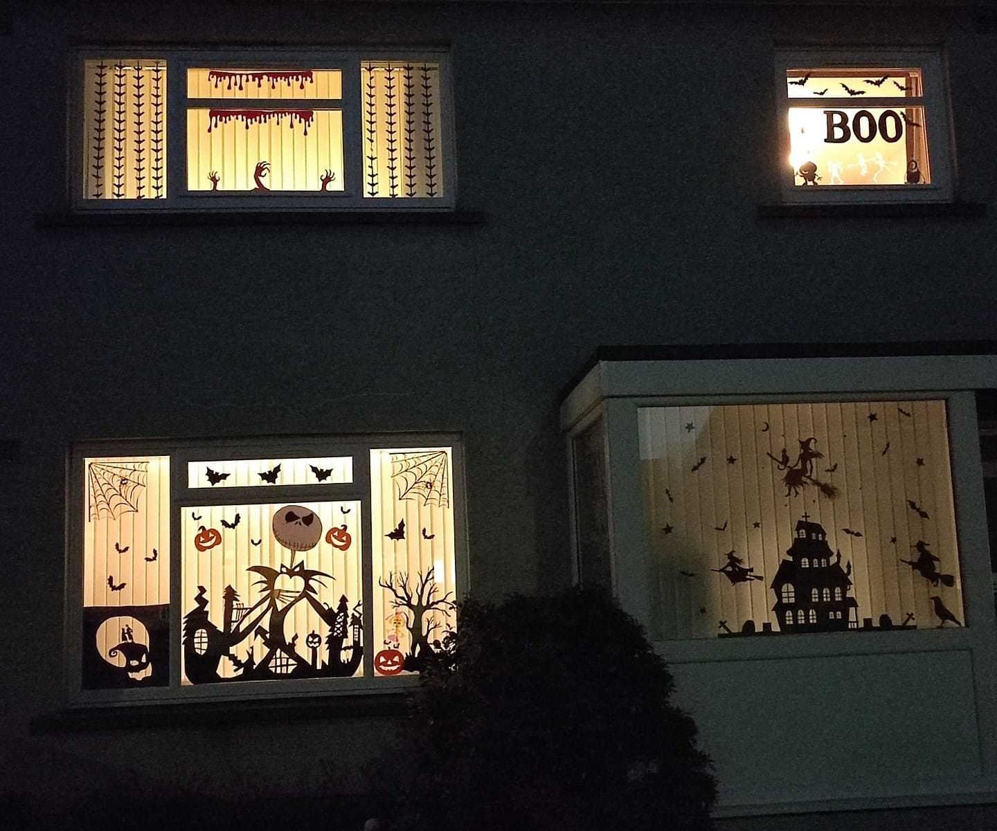 Laura Graves and her daughter Evie decorated all the windows at the front of their home.