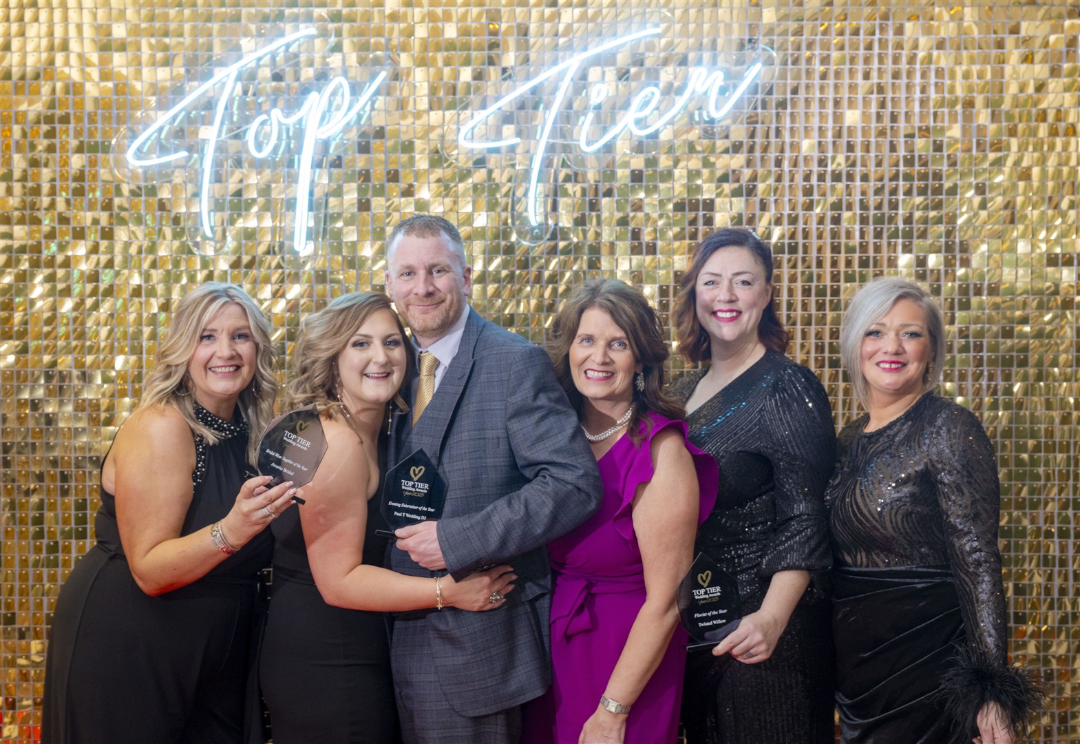 Proudly showing off their awards are (from left) Leigh-Anne Murray (Avorio), Gemma Innes (Avorio), Paul Tough, Sonia Pozzi (Avorio), Caroline Holmes (Twisted Willow) Ashley Smith. Picture: Photography by aberdeenphoto.com