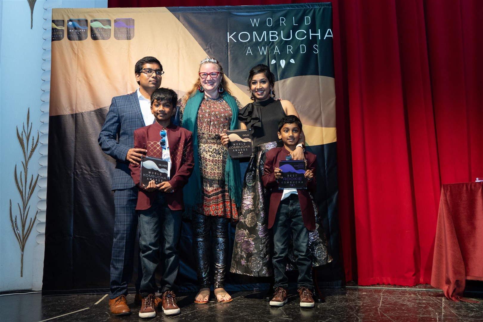 Kompassion Kombucha owner Rajkumar Dhanaraj and his family at the awards ceremony in Spain.
